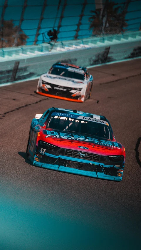 Denssi-liveried NASCAR Xfinity car racing, the brand sponsors motorsport on both sides of the Atlantic
