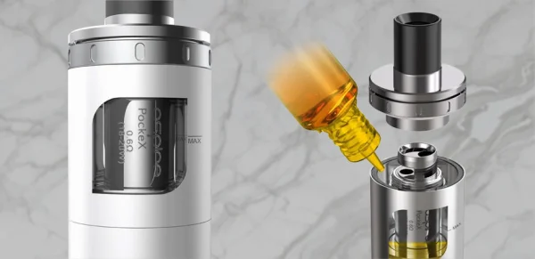 Aspire PockeX AIO top-fill port with e-liquid being filled against a marble background