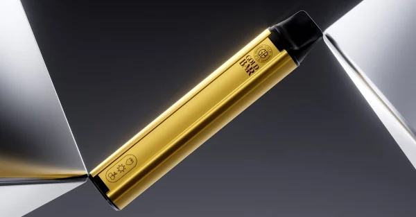 Gold Bar Pod System device showing the gold metallic body and pod slot