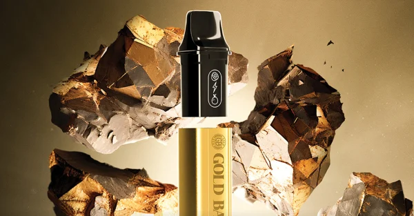 Gold Bar Pod System rechargeable vape kit against a gold rocky background